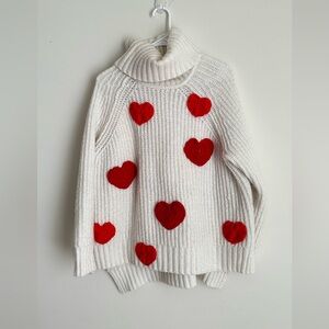 Cozy White Sweater with Red Heart Accents